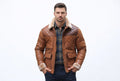 Front view of the brown Urban Mantle Supreme Luxe Lambskin and Suede Leather Jacket featuring a cream shearling collar and diamond-quilted panels.