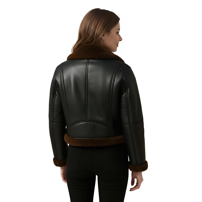Urbanclad women's cropped matte black genuine soft lambskin real leather aviator jacket featuring plush dark brown shearling fur collar with leather throat buckle latch, front metal zip closure, side welt pockets, fur-trimmed cuffs and hem, long fitted sleeves, and custom made-to-measure fitting across the UK, USA, and Australia.back