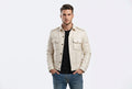 Front view of a man wearing the pure white Venom Rogue Signature Lambskin Edge Leather Jacket featuring button-flap chest pockets and shoulder epaulettes.