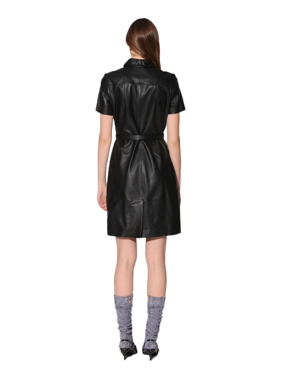 Vesper Noir women's jet black genuine lambskin leather jumpsuit featuring a classic point collar, concealed front placket, short sleeves, self-tie leather waist belt, side pockets, structural horizontal seamwork, and custom made-to-measure fitting across the UK, USA, and Australia.back